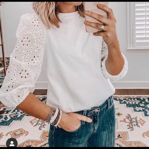 Super cute top with accent sleeves
